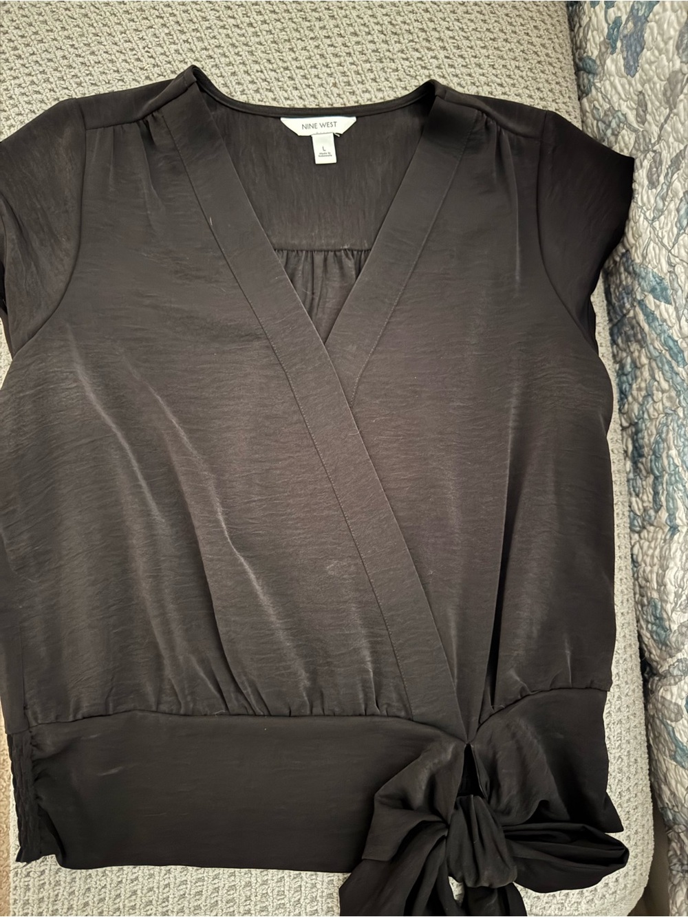 Nine West Black cross body top with tie detail at gathered waist.
